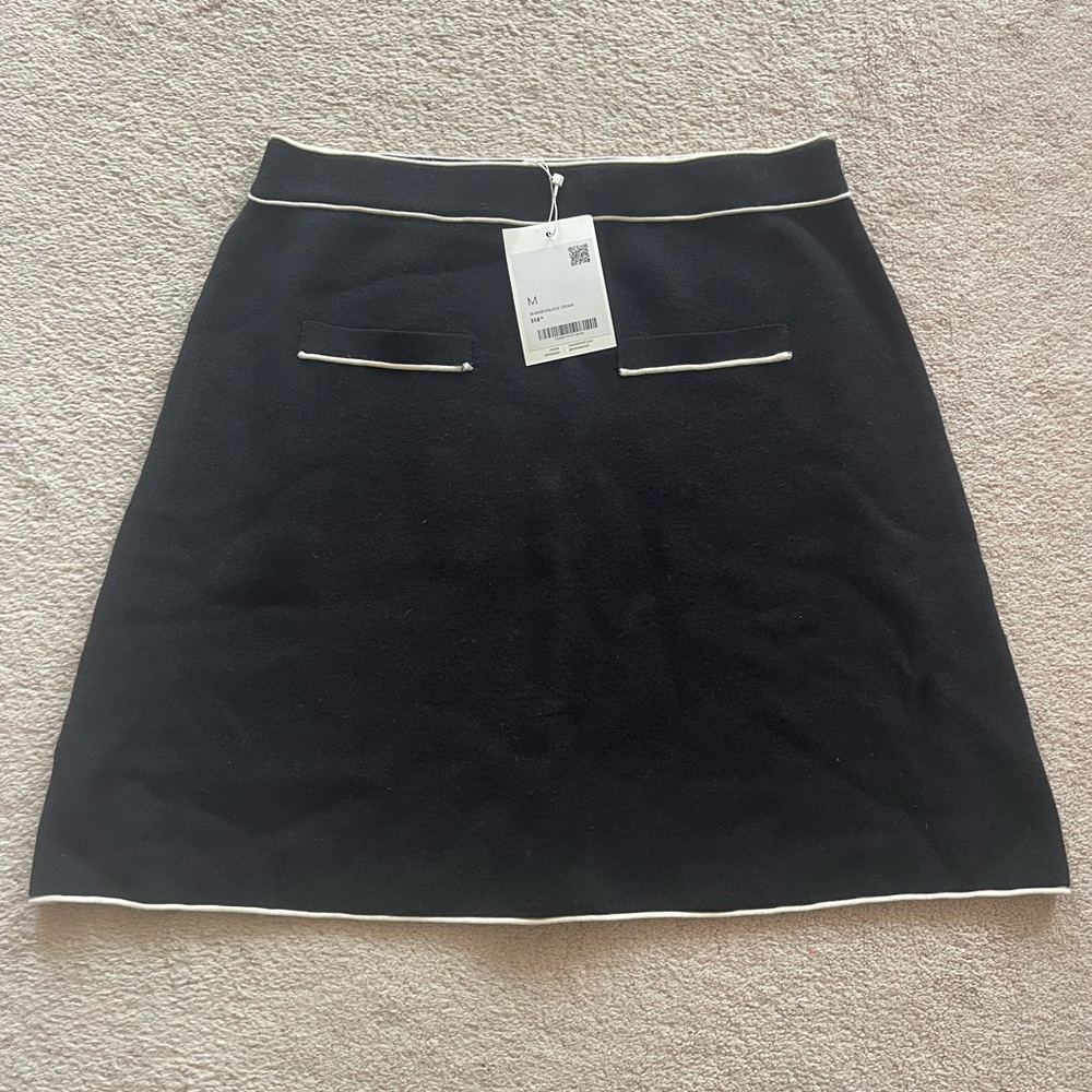 Elegant Black Skirt with White Trim